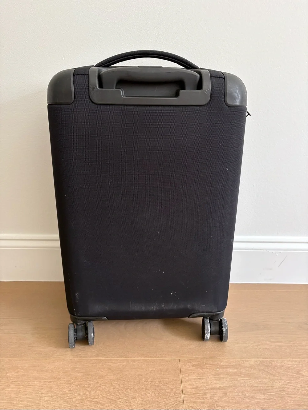 Away Black Carry-On Travel Case with Spinner Wheels (expandable collection)